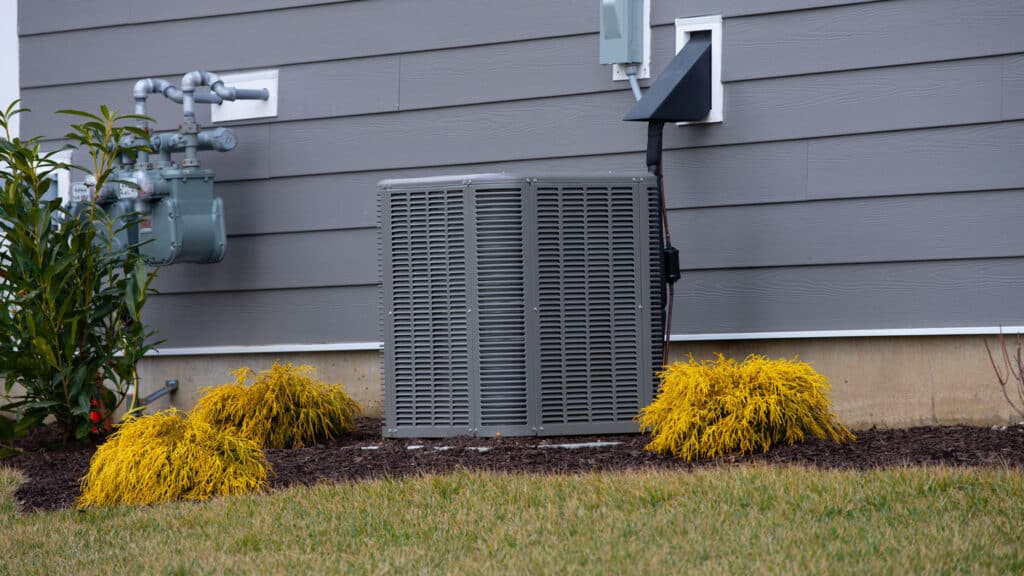 An AC unit outside of a home in Utah - part of a plan to increase the home value